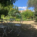 Jardin avec espace détente ombragé