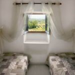 Chambre avec 2 lits simples