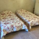 Chambre avec deux lits simples