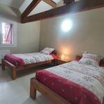 Chambre 4 avec deux lits simples