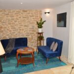 Petit coin salon partagé aux 4 chambres
