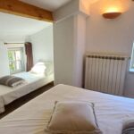 Chambre avec lit double et lit simple